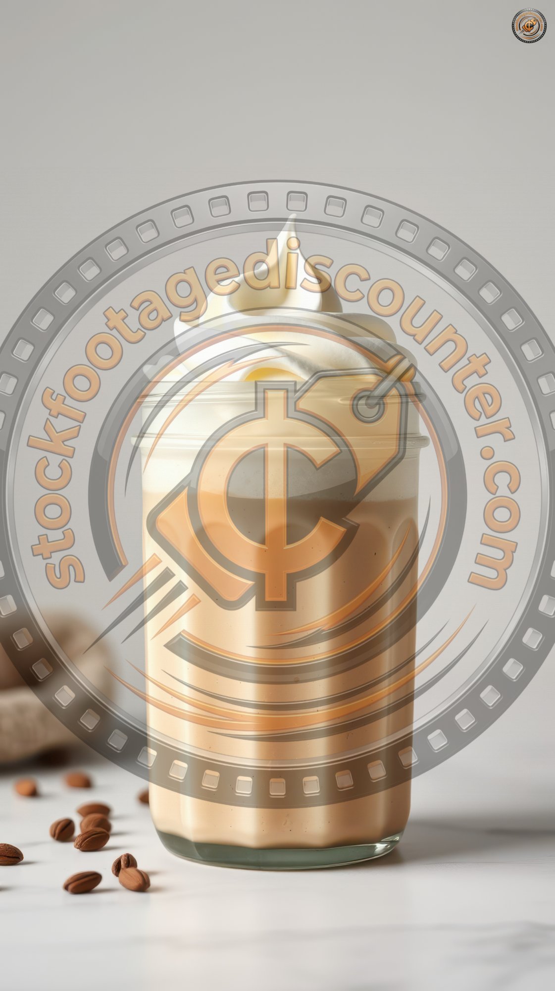 Creamy coffee drink topped with fluffy whipped cream served in a glass jar on a clean countertop