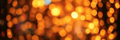 Warm glowing lights create a cozy atmosphere in a festive setting during the evening hours