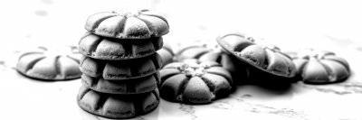 D e l i c i o u s   f r e s h l y   b a k e d   c o o k i e   t o w e r s   s e r v e d   o n   a   m a r b l e   c o u n t e r t o p   w i t h   d e c o r a t i v e   i c i n g ,   p e r f e c t   f o r   s h a r i n g   a t   g a t h e r i n g s
