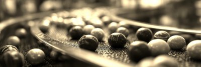 Conveyor Belt Line Of Chocolates Sweets In Food Fac 1d43dd33 9d83 439f 96f7 5245cc07f4d1 1 Gigapixel Standard 6x Sepia