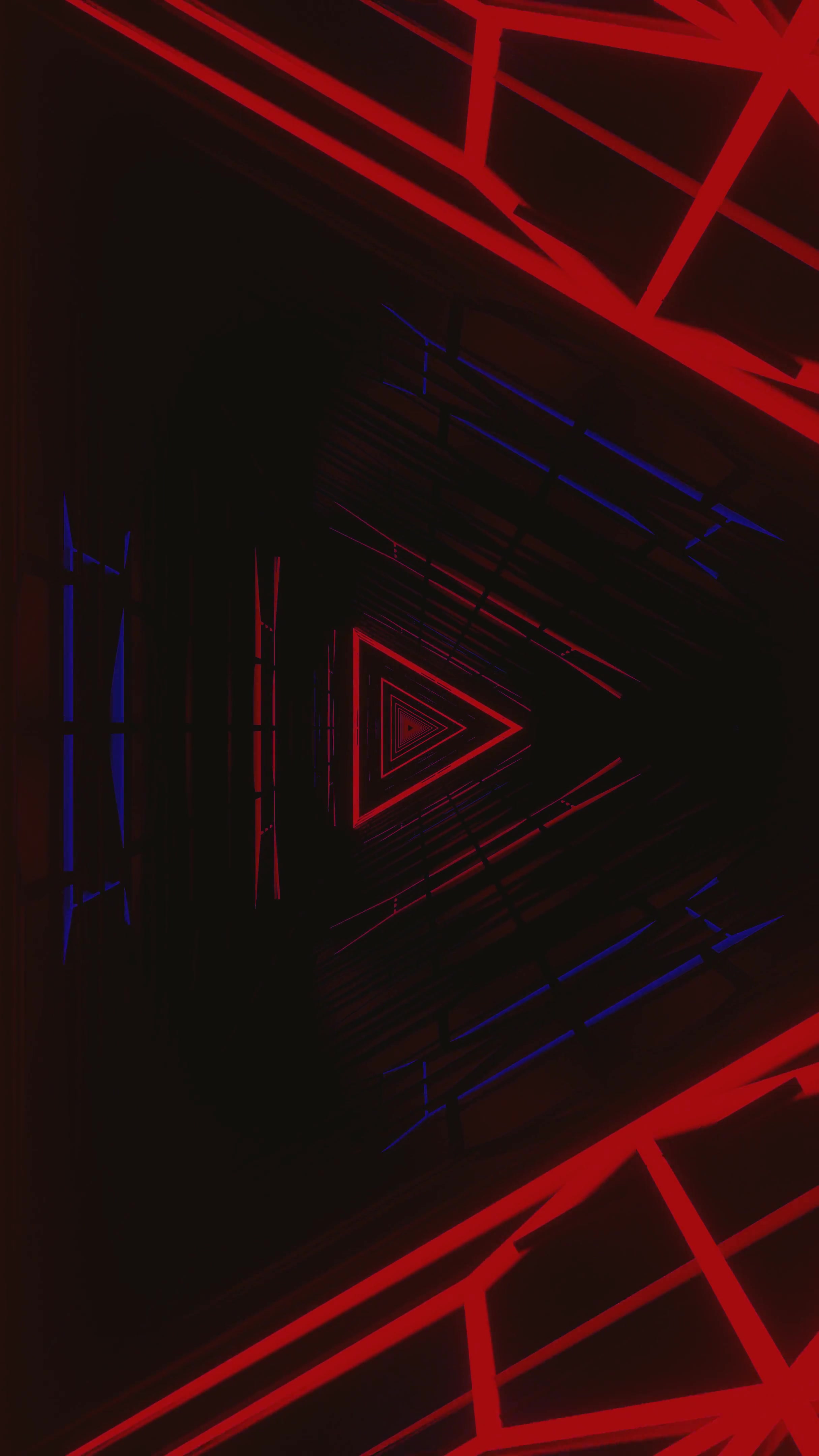 Seamless tunnel video loop featuring vibrant red and purple trian