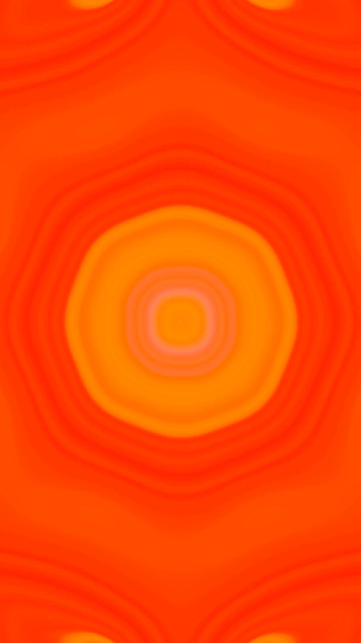 Colorful tunnel video loop creates mesmerizing visual experience for screensaver or display, featuring warm orange and yellow tones in fluid motion