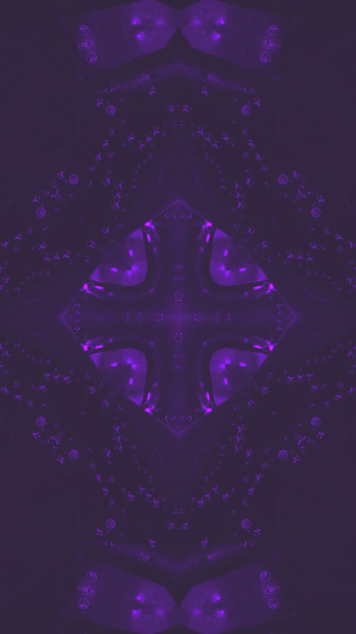 Seamless tunnel video loop screensaver featuring vibrant purple l