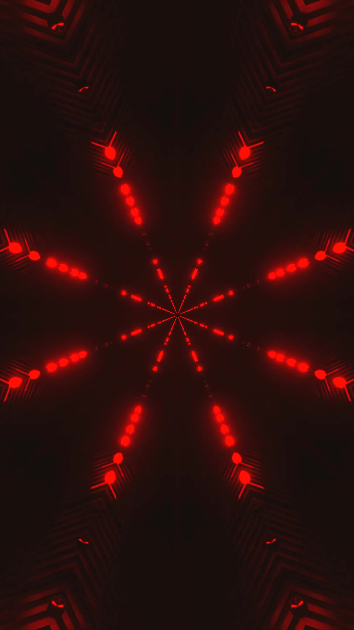 Tunnel video loop featuring vibrant red lights and geometric patt