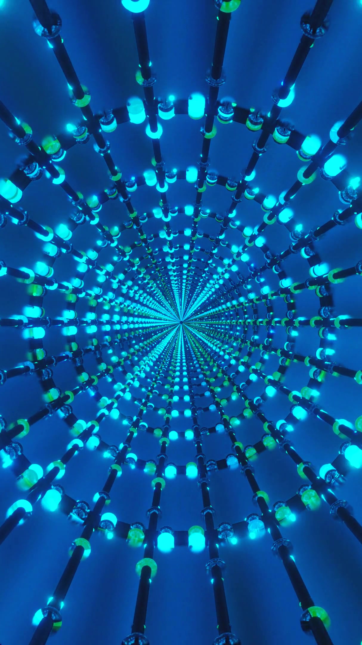 Dynamic tunnel video loop showcasing vibrant blue and green lights creating a mesmerizing seamless experience