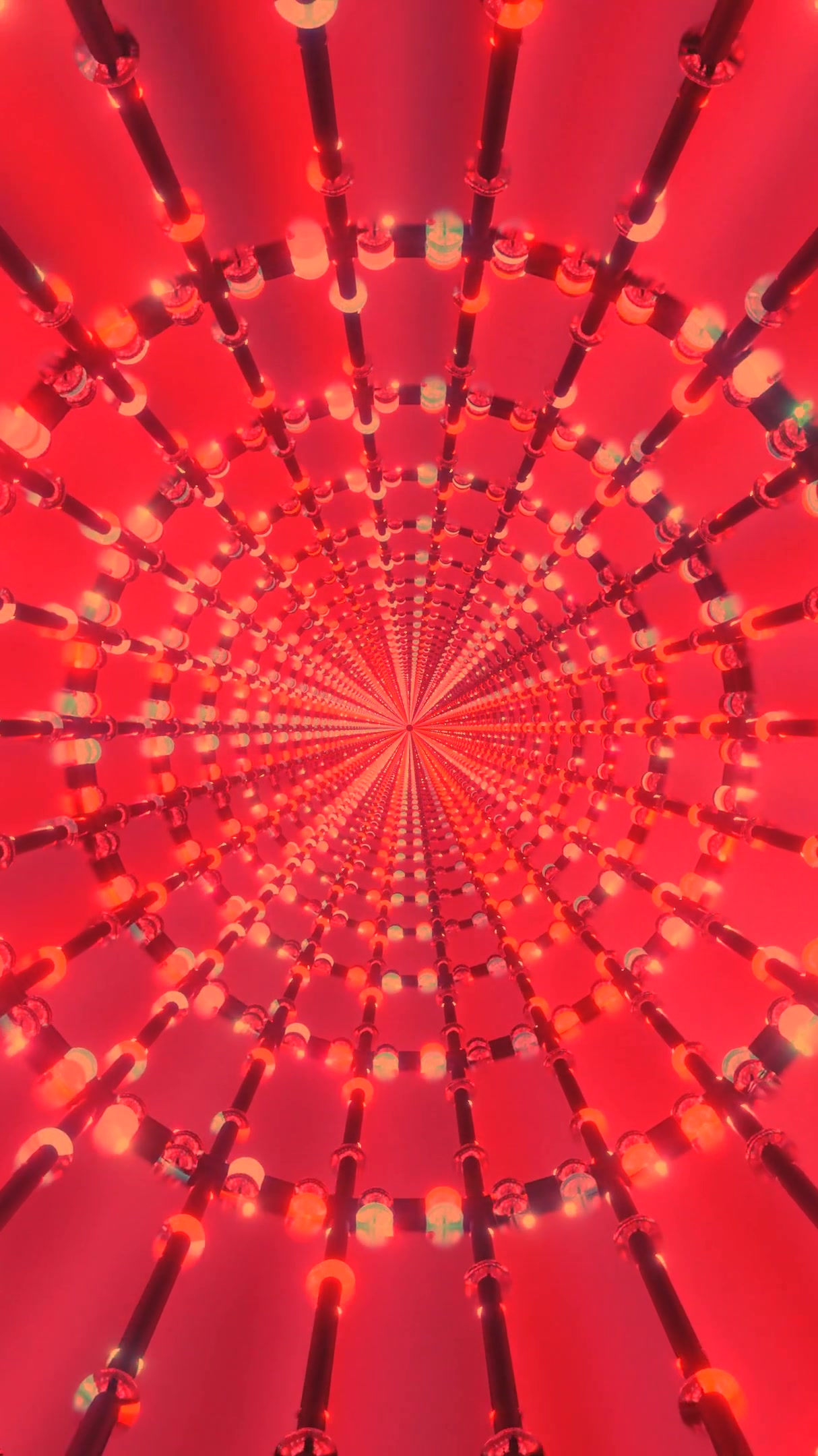 Vibrant tunnel video loop with red lights creating a dynamic visual experience in a seamless animated format