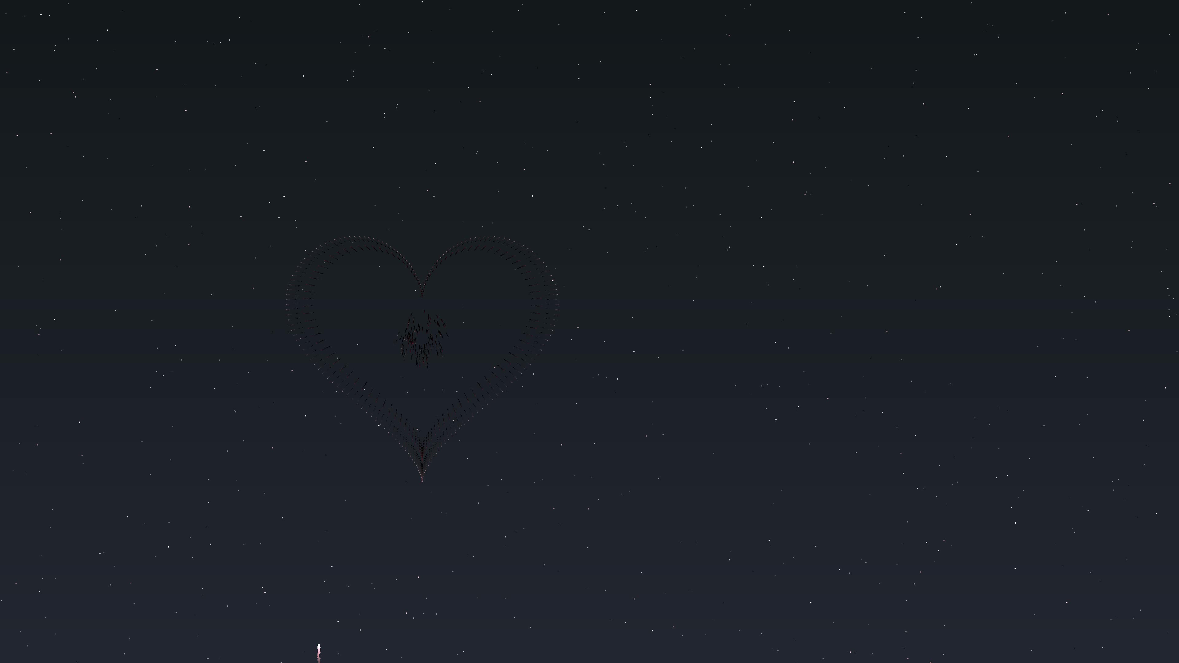 Fireworks display with heart shapes for Valentines Day celebration at night sky